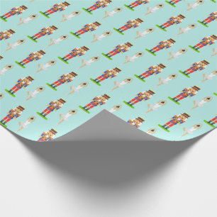 Nutcracker and ballet dancer on light teal wrapping paper