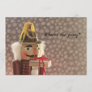 Nutcracker with silver gift invitation
