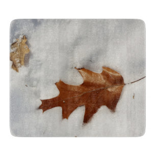 oak leaf on the snow cutting board