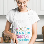 Obsessive Cupcake Disorder Standard Apron<br><div class="desc">Yummy and pretty frosted light pink and blue cupcakes decorate this cute apron gift for a baker who runs a bakery or someone with a sweet tooth.</div>