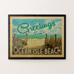 Ocean Isle Beach Jigsaw Puzzle Vintage Travel<br><div class="desc">This Greetings From Ocean Isle Beach vintage postcard design features a sandy beach with a beautiful turquoise ocean water and above the sea,  a blue sky with billowy white clouds. In vintage travels style.</div>