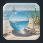 Ocean Reflection in a Lens Ball Paper Plate<br><div class="desc">A sailboat on a sunlit ocean,  its reflection captured in a glass lens ball on beach sand next to a starfish</div>