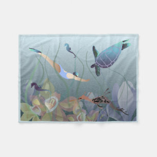 Ocean swimming with seahorse and turtle fleece blanket