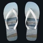 Ocean Waves Blue Sky Beach Sand Jandals<br><div class="desc">Pretty Blue Sky with Light Fluffy White Clouds, Blue Sea, Crashing Ocean Waves and Beach Sand Unisex Flip Flops. Shown with Wide White Straps and White Footbed. See options for flip flops in Slim Straps for more strap colours. Perfect for your summertime fun, trips to the beach, vacations, honeymoon or...</div>