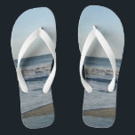 Ocean Waves Blue Sky Beach Sand Jandals<br><div class="desc">Pretty Blue Sky with Light Fluffy White Clouds, Blue Sea, Crashing Ocean Waves and Beach Sand Unisex Flip Flops. Shown with Wide White Straps and White Footbed. See options for flip flops in Slim Straps for more strap colours. Perfect for your summertime fun, trips to the beach, vacations, honeymoon or...</div>