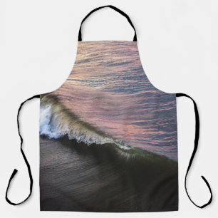 OCEAN WAVES CRASHING ON SHORE DURING DAYTIME APRON