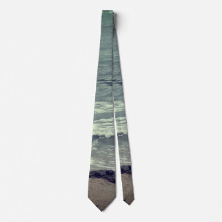 Ocean waves on the beach tie