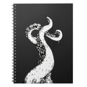 octopus tentacles on black spiral bound notebook
