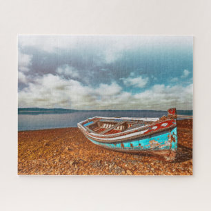 Old Aiola. Portuguese traditional boat in a beach Jigsaw Puzzle