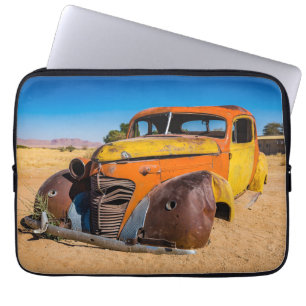 Old and abandoned car in Solitaire, Namibia Laptop Sleeve
