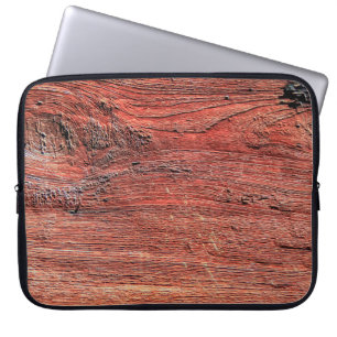 Old and rustic hardwood log surface, background te laptop sleeve