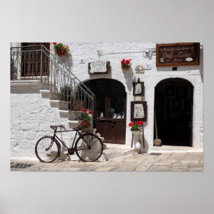 Old bike and storefront in Apulia Poster