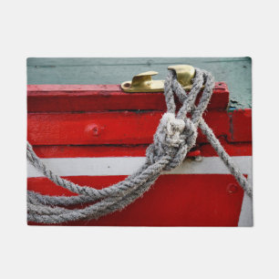 Old Bow Ropes On Brass Cleat On Canal Boat Doormat