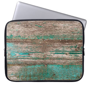 Old brown-blue wooden background with peeling pain laptop sleeve