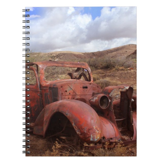 Old Car Rusting In Desert Landscape Notebook (Front)