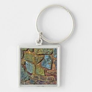 Old colourful stone wall texture key ring