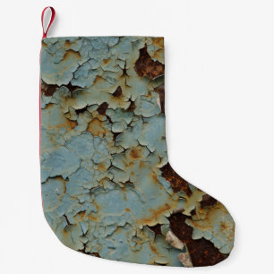 Old, corroded rusty metallic background. small christmas stocking