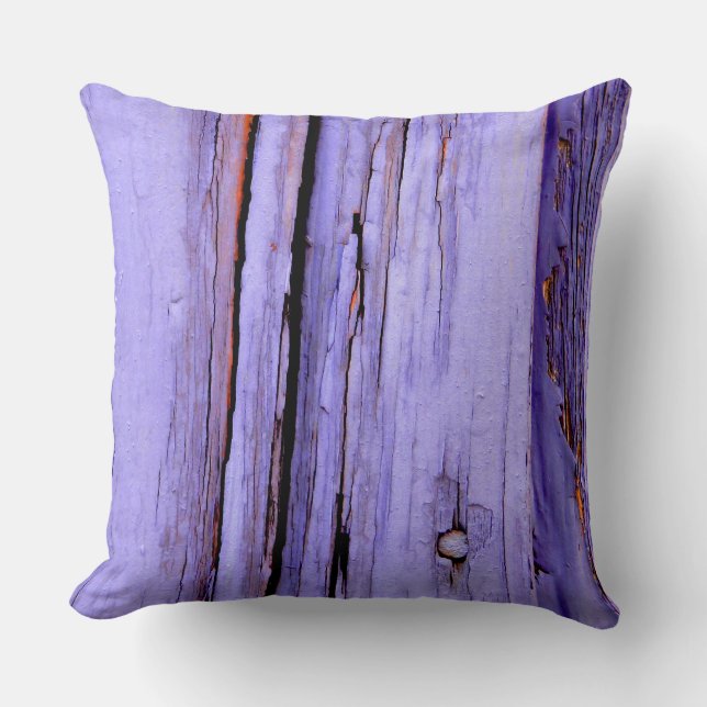 Old cracked purple paint on wood cushion (Front)