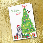 Old English Sheepdog, Bird and Christmas Tree Holiday Card<br><div class="desc">On the front of this Christmas card, a beautiful Old English Sheepdog wears a red and white Santa Claus hat while he sits beside a Holiday tree. Brightly wrapped gift packages are scattered about, and a bullfinch is landing on the Christmas tree. The red and green text says "Christmas JOY"....</div>