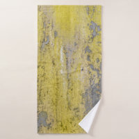 Old gray concrete wall with peeling yellow paint. 