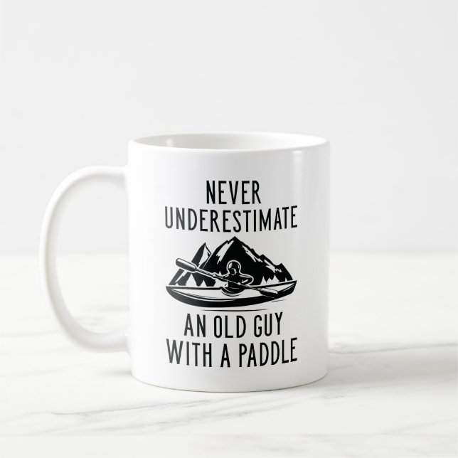 Old Guy With A Paddle Coffee Mug (Left)