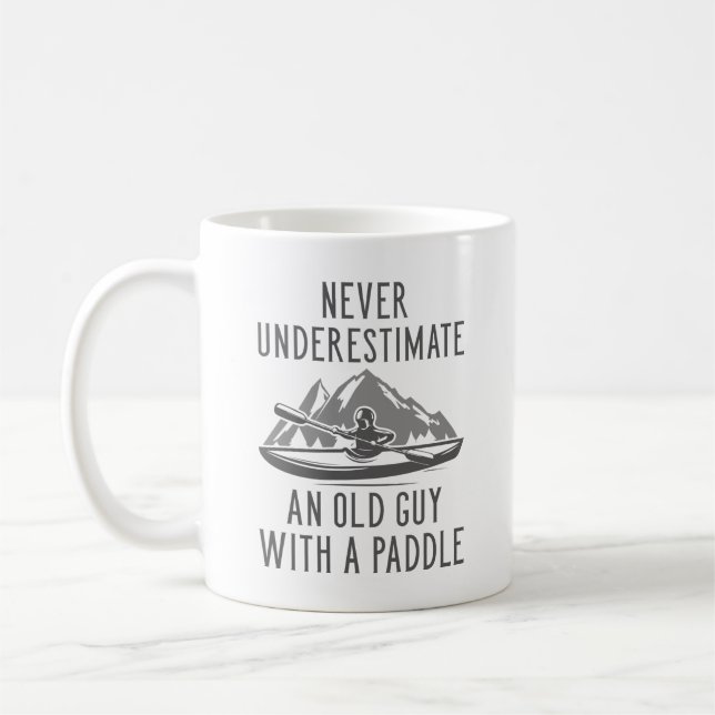 Old Guy With A Paddle Coffee Mug (Left)
