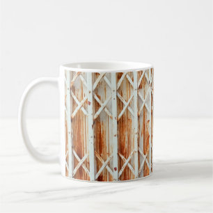 Old iron door panels are rusted. abstract,antique, coffee mug