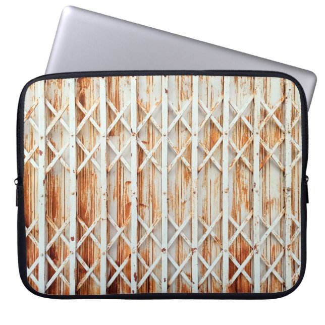 Old iron door panels are rusted. abstract,antique, laptop sleeve (Front)