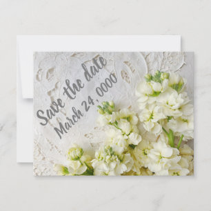 Old lace with white flowers save the date