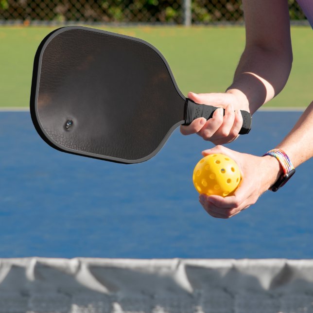 Old leather black flat surface luxury pickleball paddle (Insitu)