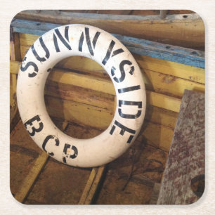 Old Life Preserver In An Abandoned Cannery Square Paper Coaster