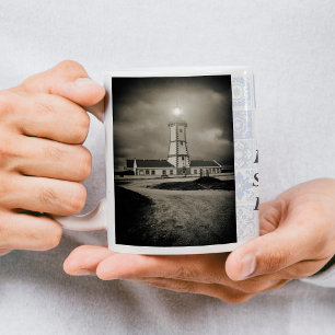 Old lighthouse on a storm night coffee mug