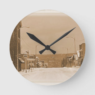 Old Main Street in the Snow Round Clock