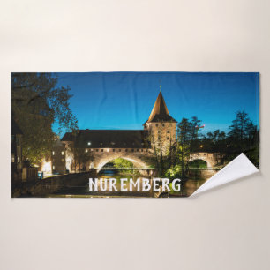 Old medieval bridge at night in Nuremberg Bath Towel