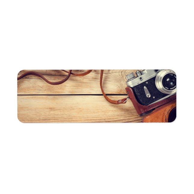 Old Retro Camera On Wooden Table Background (Front)