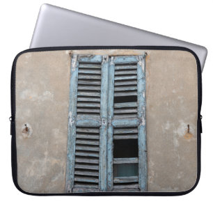Old ruined wooden window of old houseancient,antiq laptop sleeve
