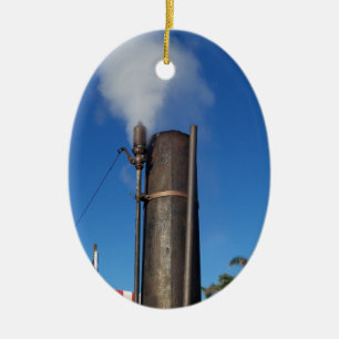 old steam whistle with a white plume of steam ceramic tree decoration