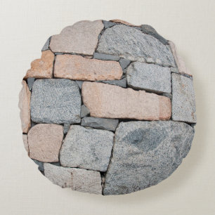 Old stone wall of ancient castle. abstract,ancient round cushion