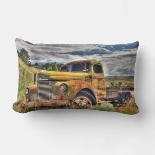 Old truck abandoned in field lumbar cushion