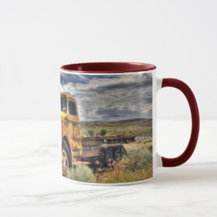 Old truck abandoned in field mug