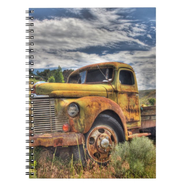 Old truck abandoned in field spiral notebook (Front)