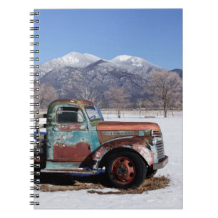 Old truck sitting in the field spiral notebook