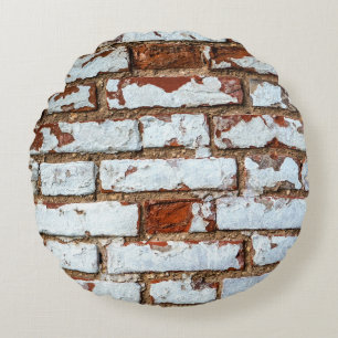 Old vintage brick wall with sprinkled white plaste round cushion