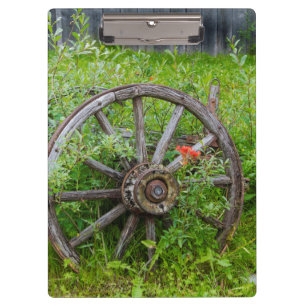 Old wagon wheel in historic old gold town 3 clipboard