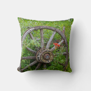 Old wagon wheel in historic old gold town 3 cushion