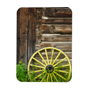 Old wagon wheel in historic old gold town magnet