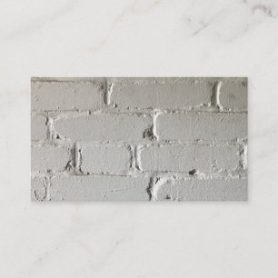 Old white brick wall with nooks and crannies business card