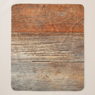 Old wooden fence. wood palisade background. planks sherpa blanket
