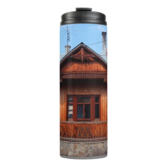 Old wooden traditional house accommodation, ancien thermal tumbler (Front)