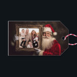 Old World Santa | Add-Your Photo | Luxe Christmas Gift Tags<br><div class="desc">This gorgeous Christmas photo gift tag features a photo of Santa holding a frame with your favourite photo. The back has a luxurious red and gold background. In the centre with a hand written "Merry Christmas" greeting. You can personalise with your names and a year. All text can be edited...</div>